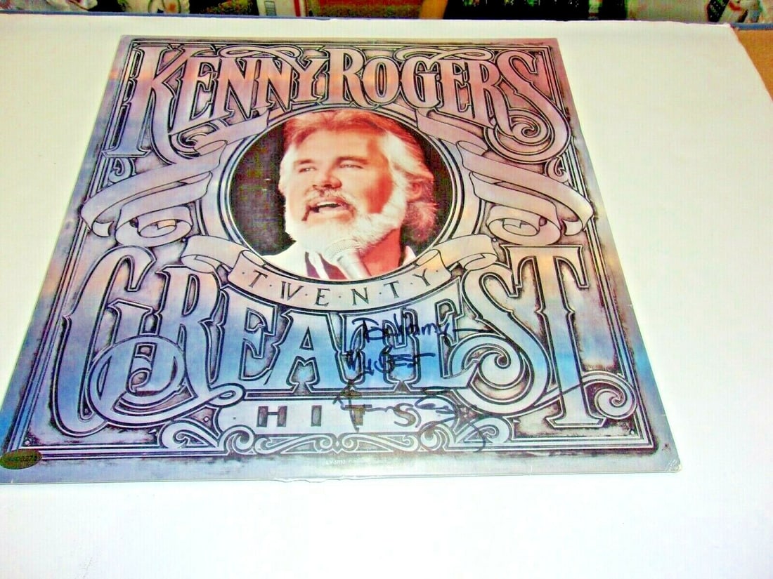 KENNY ROGERS THE GAMBLER SIGNED LP RECORD ALBUM: KENNY ROGERS THE GAMBLER SIGNED LP RECORD ALBUM This original vinyl record album features Kenny Rogers' iconic music collection titled 'The Gambler.' The album is signed by the legendary country singe