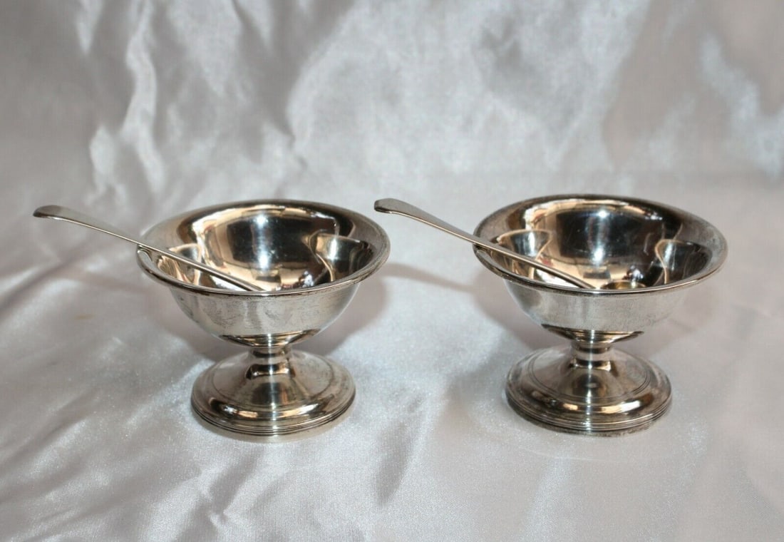 1800's Sheffield Sterling Silver Salt Holders with Spoons: 1800's Sheffield Sterling Silver Salt Holders with Spoons This exquisite pair of sterling silver salt holders, crafted by John Roberts & Co. in the early 1800s (1809-1810), showcases the elegance of S