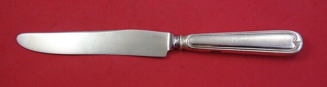 Fiddle Thread Sterling Silver Dinner Knife French Wide 9 3/4": Fiddle Thread Sterling Silver Dinner Knife French Wide 9 3/4" This exquisite dinner knife features the iconic Fiddle Thread pattern by Frank Smith, crafted from high-quality sterling silver. The piece