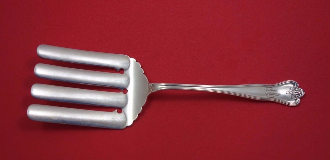 Priscilla Sterling Silver Asparagus Fork 9 3/8": Priscilla Sterling Silver Asparagus Fork 9 3/8" This exquisite Priscilla pattern serving fork by Frank Smith is crafted from high-quality sterling silver, measuring 9 3/8 inches in length. This aspara