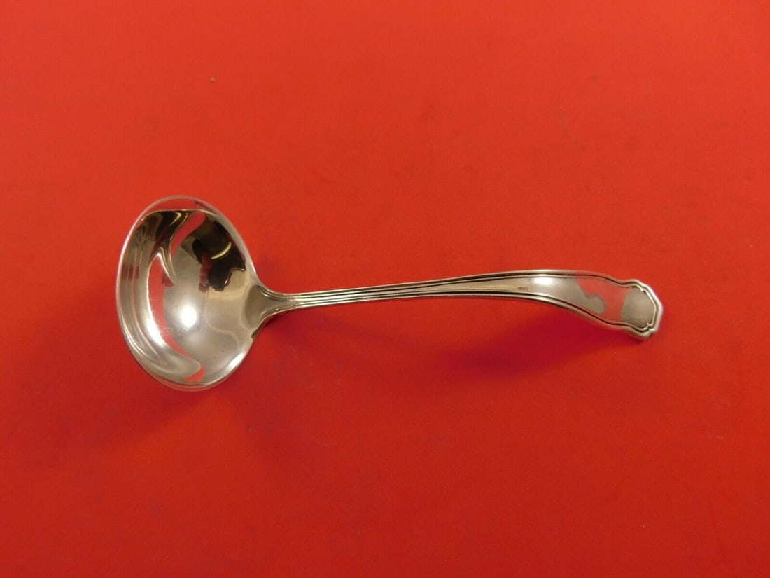 Winchester Sterling Silver Mayonnaise Ladle 4 3/4": Winchester Sterling Silver Mayonnaise Ladle 4 3/4" Introducing the Winchester by Shreve Sterling Silver Mayonnaise Ladle, a beautifully crafted serving piece that embodies elegance and functionality. 