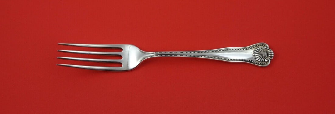 Newport Shell Sterling Silver Dinner Fork 7 5/8": Newport Shell Sterling Silver Dinner Fork 7 5/8" This exquisite dinner fork features the elegant Newport Shell pattern by Frank Smith. Crafted from high-quality sterling silver, this piece measures 7