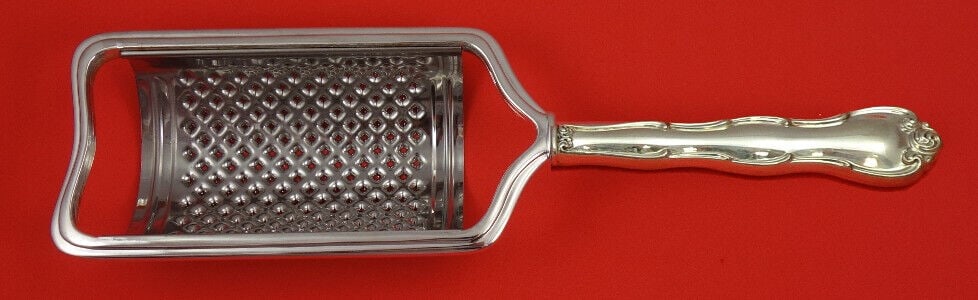 Rondo Sterling Silver Curved Cheese Grater Custom Made: Rondo Sterling Silver Curved Cheese Grater Custom Made Elevate your dining experience with this exquisite Rondo by Gorham cheese grater. Crafted from high-quality sterling silver, this custom-made pie
