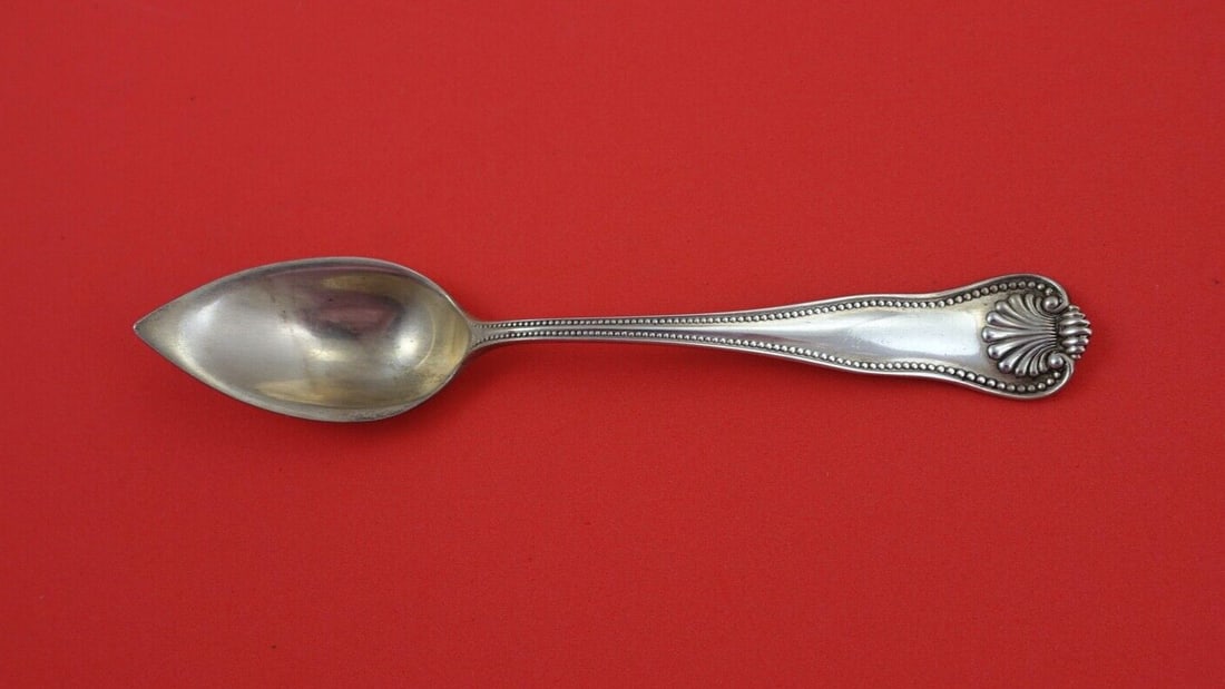 Newport Shell Sterling Silver Grapefruit Spoon 5 1/2": Newport Shell Sterling Silver Grapefruit Spoon 5 1/2" This exquisite grapefruit spoon, part of the Newport Shell pattern by Frank Smith, measures 5 1/2 inches and is crafted from high-quality sterling