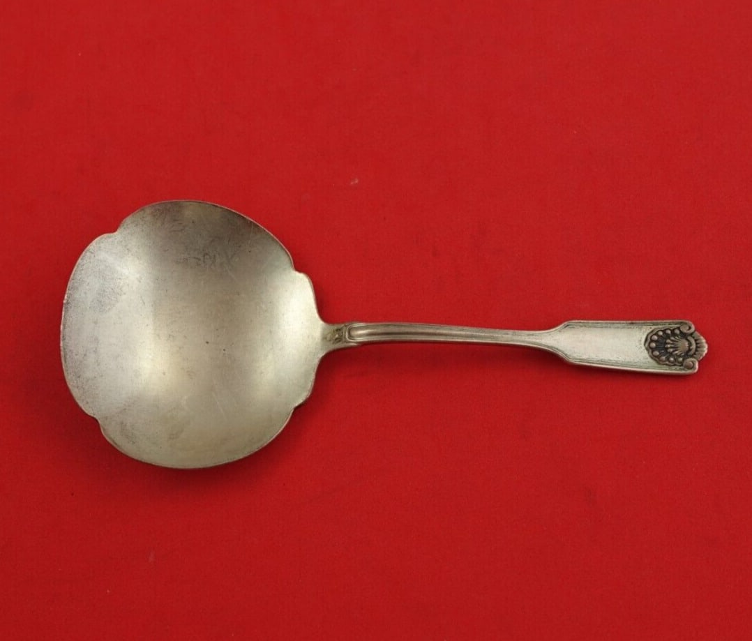 Fiddle Shell Sterling Silver Nut Spoon Solid 4 3/4" Serving: Fiddle Shell Sterling Silver Nut Spoon Solid 4 3/4" Serving This exquisite serving spoon features the Fiddle Shell pattern by Frank Smith, expertly crafted from solid sterling silver (.925). Measuring