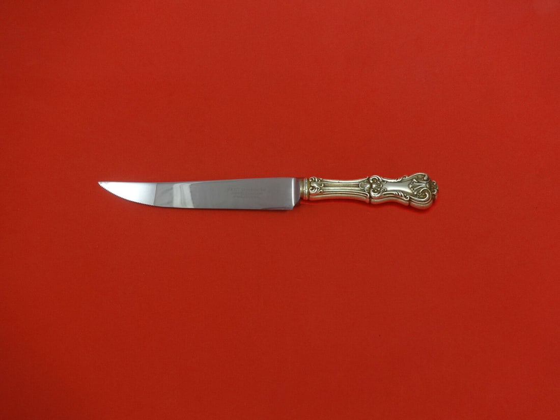 Federal Cotillion Sterling Silver Steak Knife 8 1/2": Federal Cotillion Sterling Silver Steak Knife 8 1/2" Introducing the Federal Cotillion steak knife, expertly crafted by Frank Smith. This exquisite piece features a hollow handle made of Sterling silv
