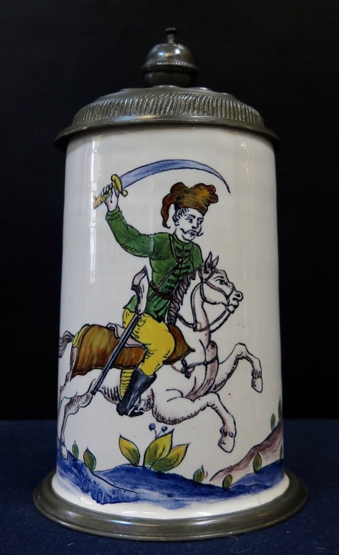 Vintage 1888 Continental Covered Stein with Pewter Fittings: Vintage 1888 Continental Covered Stein with Pewter Fittings This vintage late 19th-century Continental covered stein, crafted between 1850 and 1899, showcases exquisite hand-painted porcelain with int