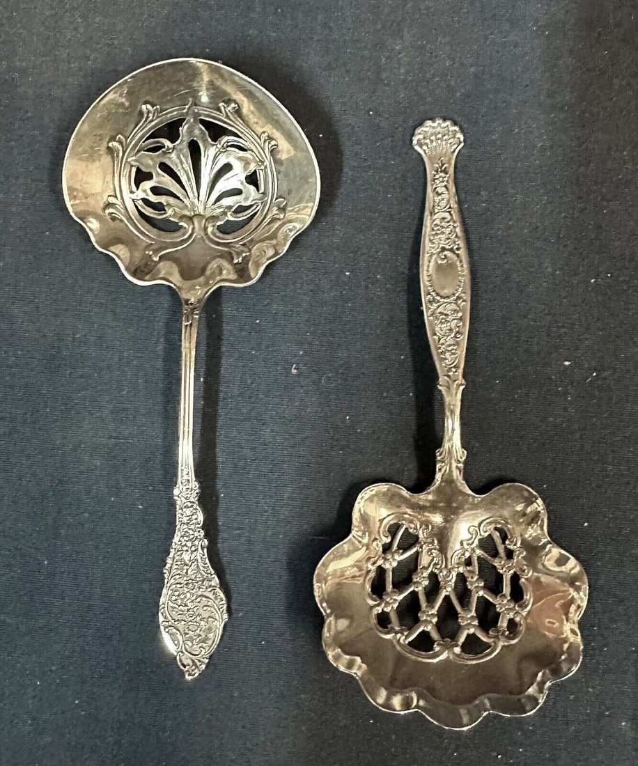 Vintage Sterling Silver Bon Bon Servers (2): Vintage Sterling Silver Bon Bon Servers (2) This exquisite set of two vintage Sterling Silver Bon Bon servers showcases a beautifully ornate design and decorative handles. Crafted by Whiting, with one