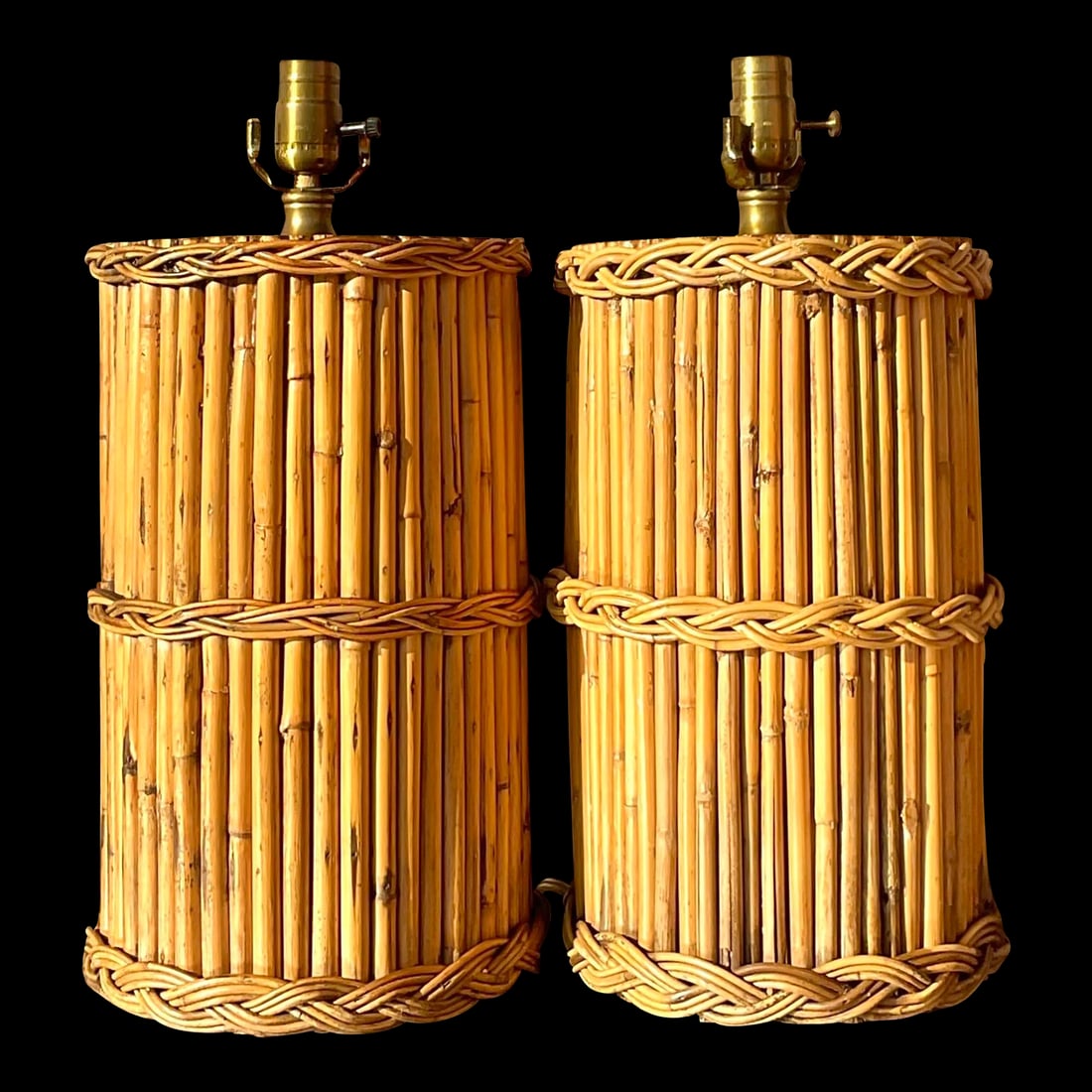 Vintage Coastal Rattan Table Lamps - a Pair: Vintage Coastal Rattan Table Lamps - a Pair A fabulous pair of vintage Coastal table lamps. Chic bundled rattan with a braided rattan double wrap. Beautiful wood grain detail on top of each lamp. Acqu