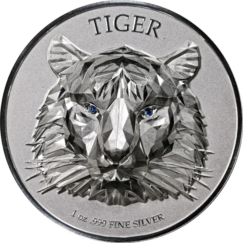 2022 Chad 1 Oz Silver 5K Francs Tiger Coin Proof .999 Fine: 2022 Chad 1 Oz Silver 5K Francs Tiger Coin Proof .999 Fine This stunning 2022 Chad 1 Oz Silver 5k Francs coin features an intricate multifaceted design of a tiger's head, enhanced by its striking blue