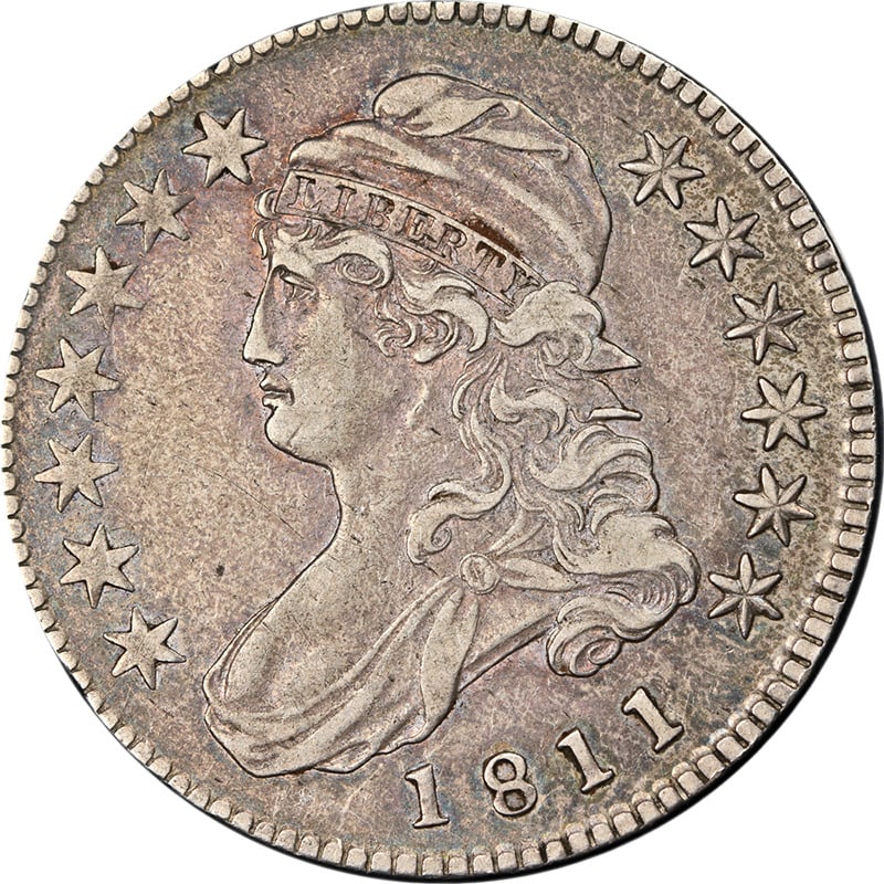 1811 Bust Half Dollar Small 8 Choice XF+ Silver: 1811 Bust Half Dollar Small 8 Choice XF+ Silver This 1811 Bust Half Dollar is a remarkable piece featuring a strong strike and the profile of a woman adorned with a cap, with 'LIBERTY' inscribed above