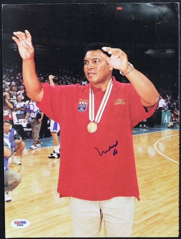 Muhammad Ali Signed 9x12 Boxing Photo PSA/DNA Authentic: Muhammad Ali Signed 9x12 Boxing Photo PSA/DNA Authentic This is an authentic signed photograph of the legendary boxer Muhammad Ali, showcasing his iconic presence in the sport of boxing. The photograp