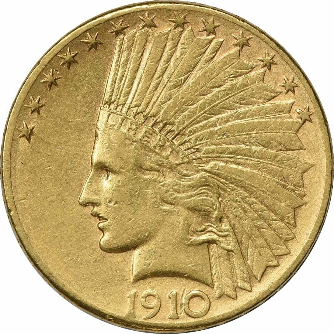 1910-D $10 Gold Indian XF Circulated: 1910-D $10 Gold Indian XF Circulated This 1910-D $10 Gold Indian coin showcases the intricate design by Augustus Saint Gaudens, featuring a profile of a Native American chief adorned with a headdress.