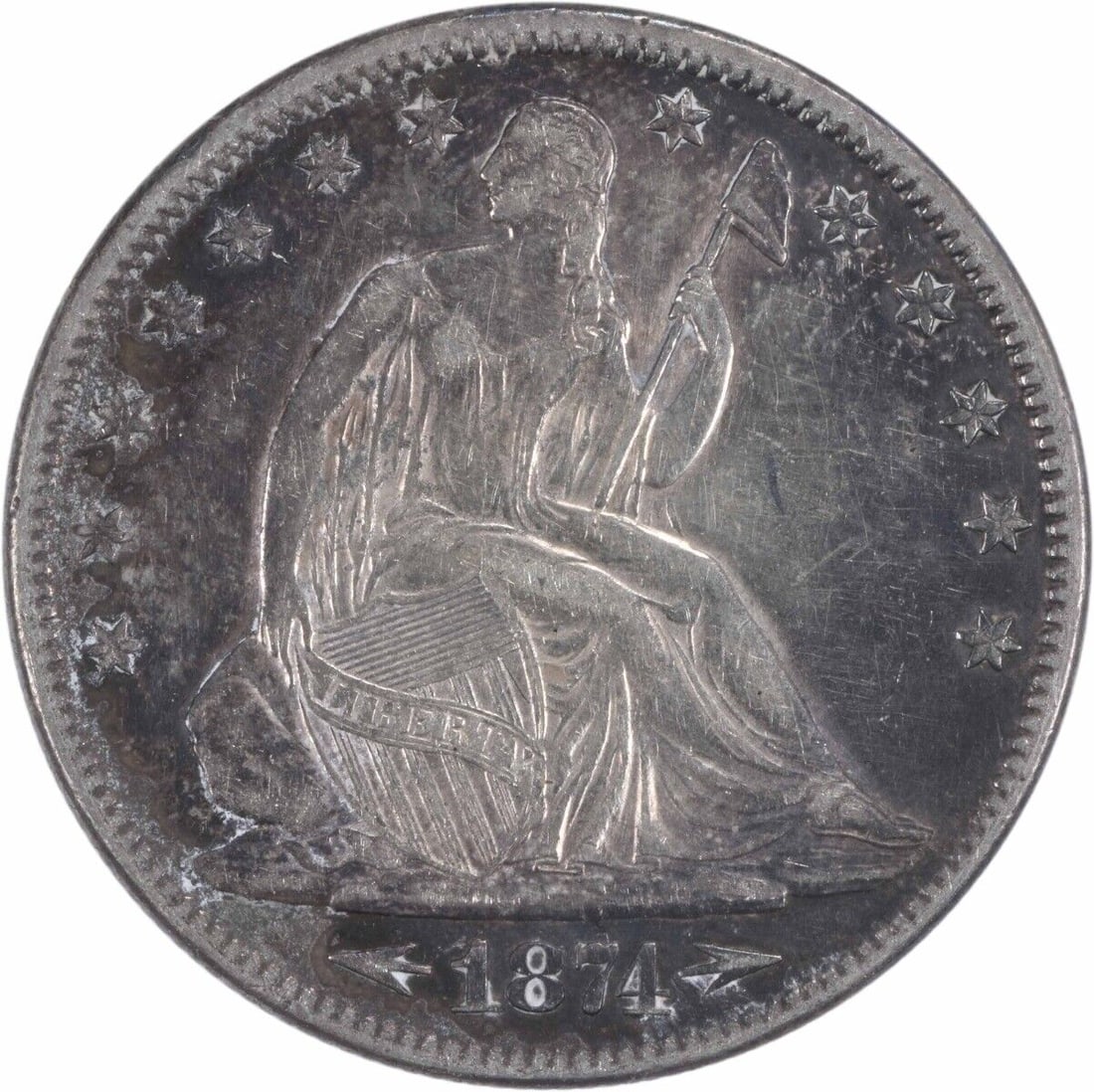 1874 Liberty Seated Half Dollar AU Circulated 50C: 1874 Liberty Seated Half Dollar AU Circulated 50C This 1874 Liberty Seated Half Dollar showcases a stunning design by Thomas Sully and Christian Gobrecht. The coin features a seated figure of Liberty