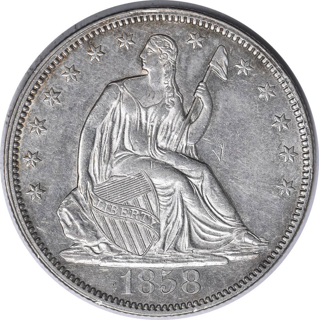 1858 Liberty Seated Half Dollar AU Circulated: 1858 Liberty Seated Half Dollar AU Circulated This 1858 Liberty Seated Half Dollar features a beautiful design by Thomas Sully and Christian Gobrecht, showcasing the iconic seated Liberty figure holdi