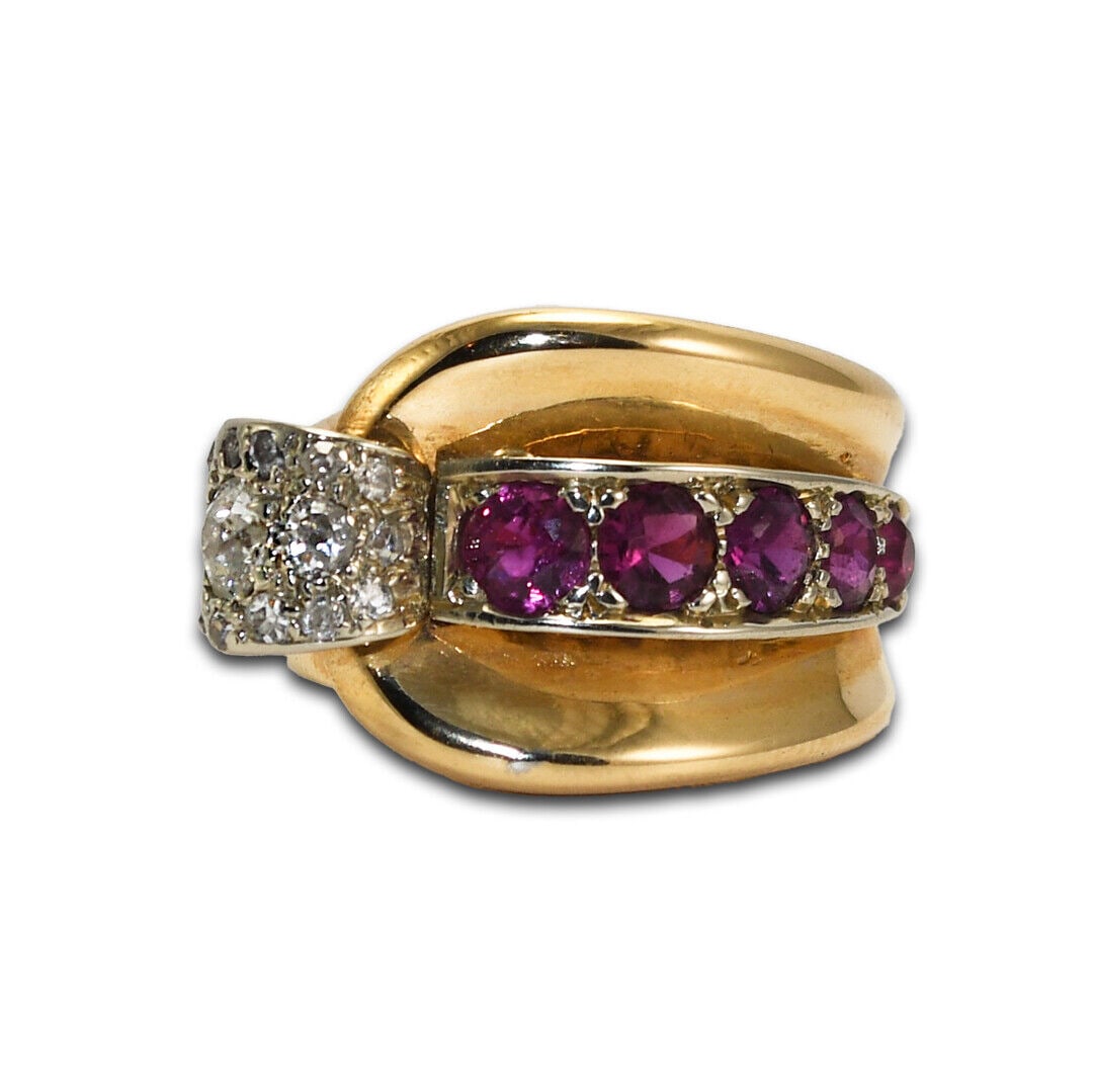 14K Rose Gold Vintage Ruby and Diamond Wrap Ring: 14K Rose Gold Vintage Ruby and Diamond Wrap Ring This stunning vintage ring features a unique wrap design crafted from 14K two-tone gold, combining elegant rose and white gold. The centerpiece is ador