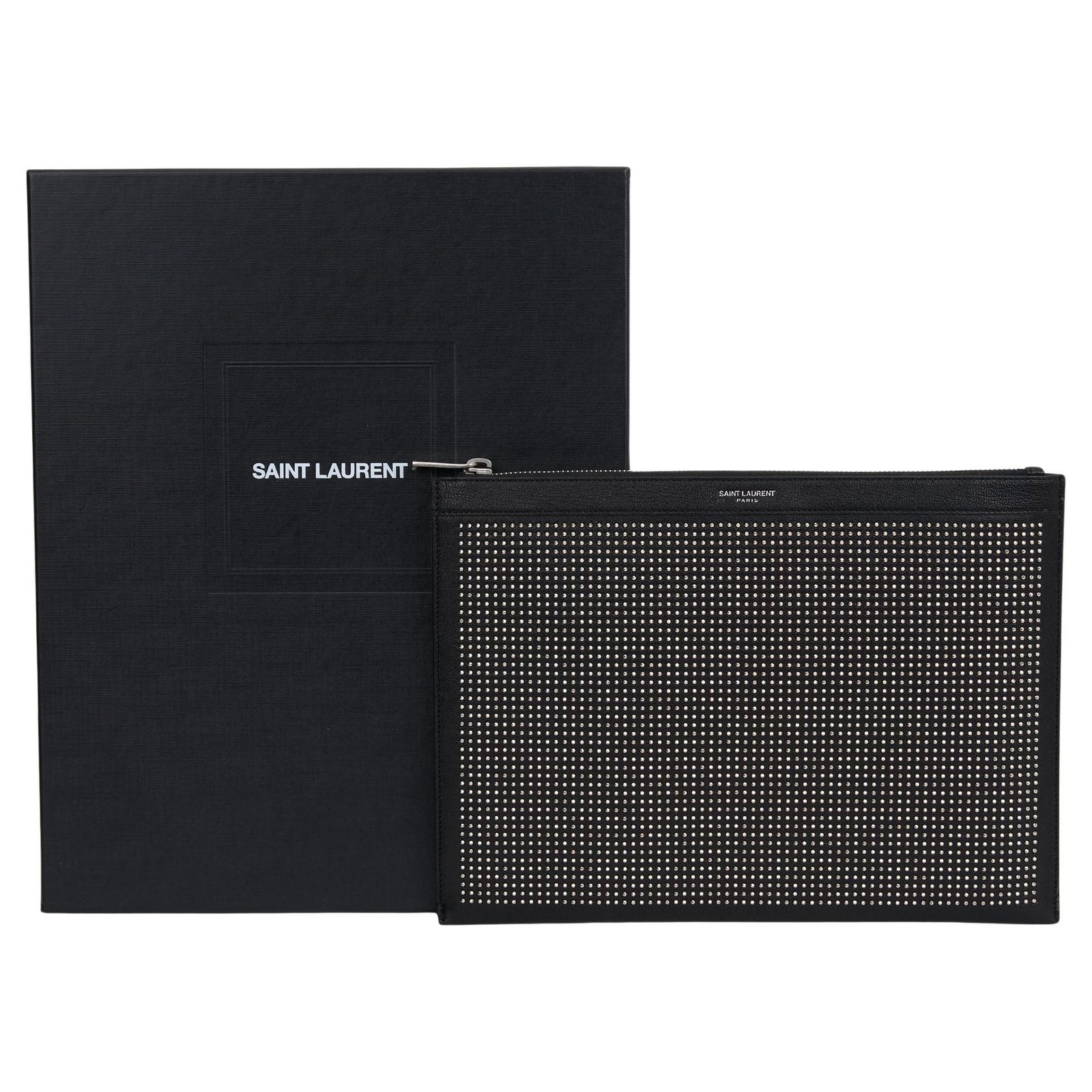 Yves Saint Laurent Studded Leather Portfolio 8.5x11.5 Italy: Yves Saint Laurent Studded Leather Portfolio 8.5x11.5 Italy Elevate your accessory collection with this exquisite Yves Saint Laurent Studded Leather Portfolio. Crafted in Italy, this portfolio showcas