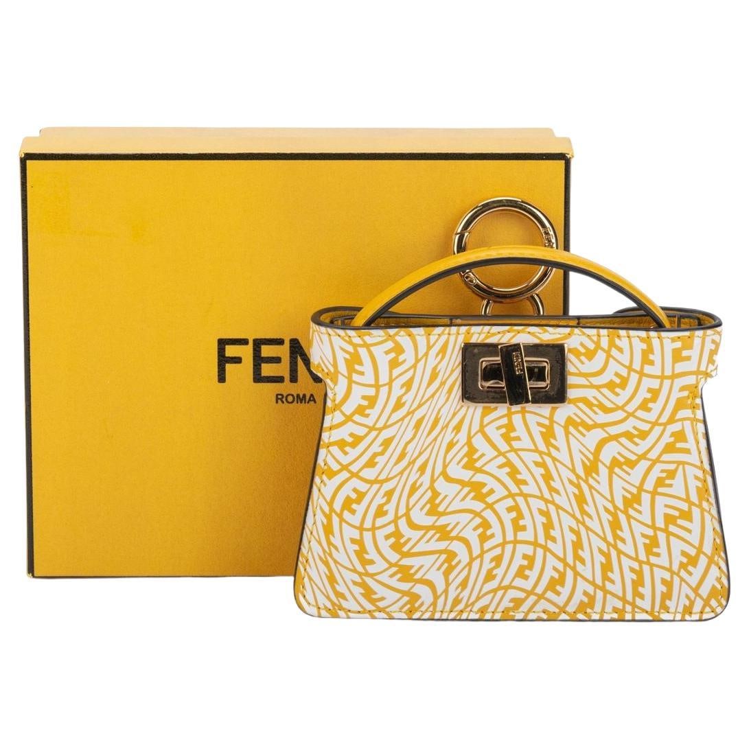 Fendi x Sarah Coleman Nano Peekaboo Bag 3.5x1.15x4.75 in New: Fendi x Sarah Coleman Nano Peekaboo Bag 3.5x1.15x4.75 in New Introducing the Fendi x Sarah Coleman Nano Peekaboo Bag, a stunning accessory that showcases a unique design collaboration. This charming b