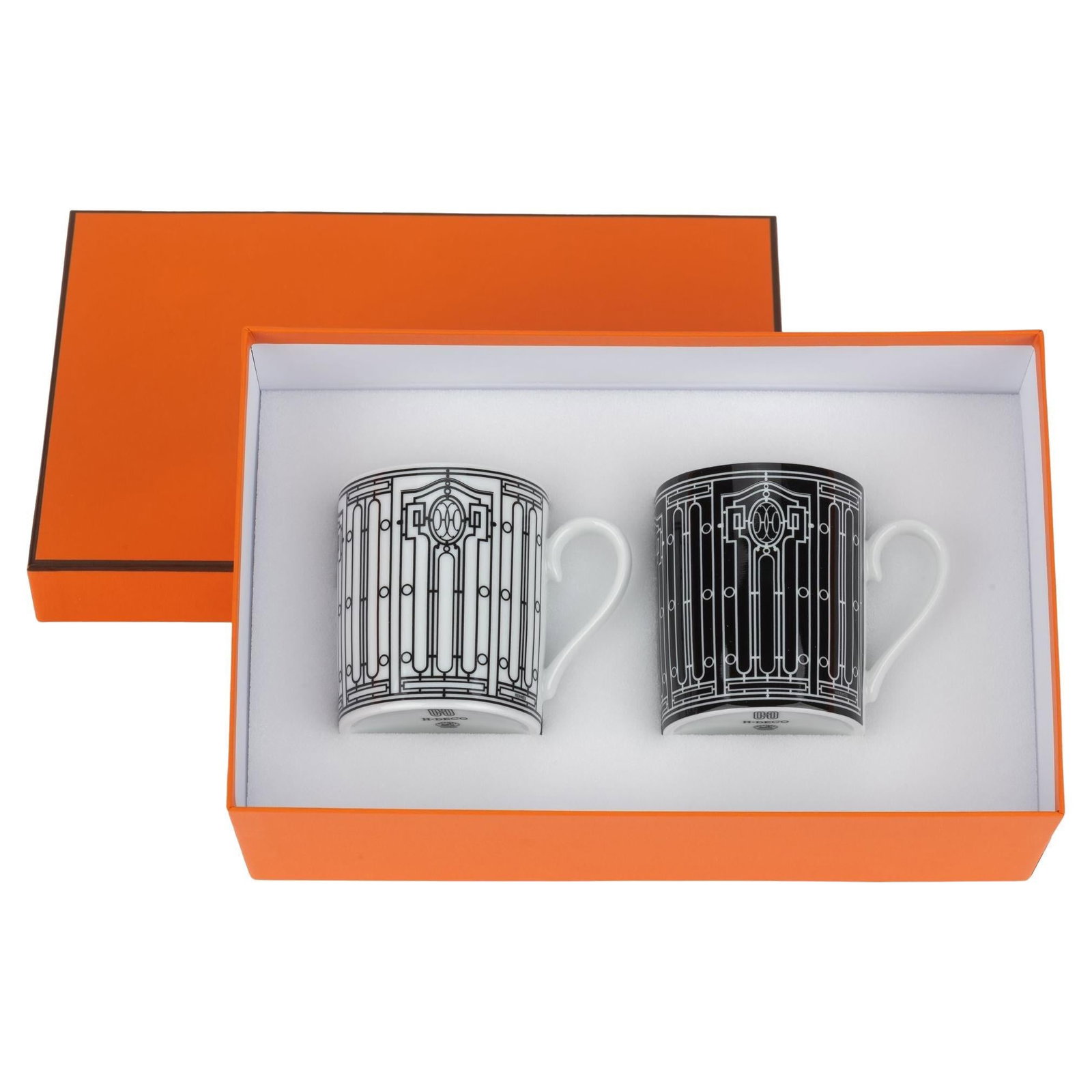 Hermes Art Deco Porcelain Mug Set of 2 with Box 3.5 in: Hermes Art Deco Porcelain Mug Set of 2 with Box 3.5 in Brand: Hermes. Dimensions: Height: 3.5 in (8.89 cm), Diameter: 2.75 in (6.99 cm). Place of Origin: France. Period: 21st Century. Hermes brand new