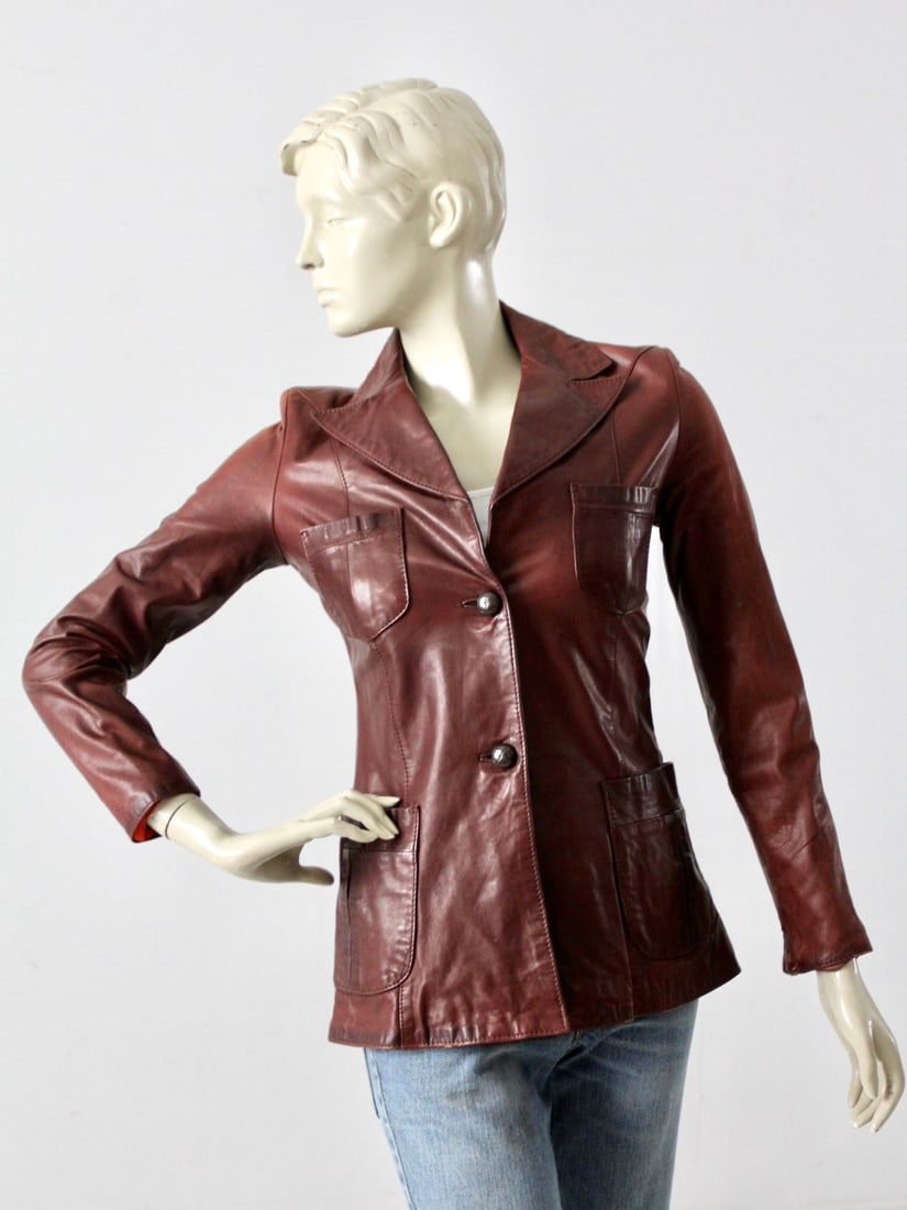 1970s Vintage Crae Carlyle Leather Jacket: 1970s Vintage Crae Carlyle Leather Jacket Discover the timeless style of this 1970s Vintage Crae Carlyle Leather Jacket. Featuring a slender fit with a touch of blazer styling, this soft chocolate bro