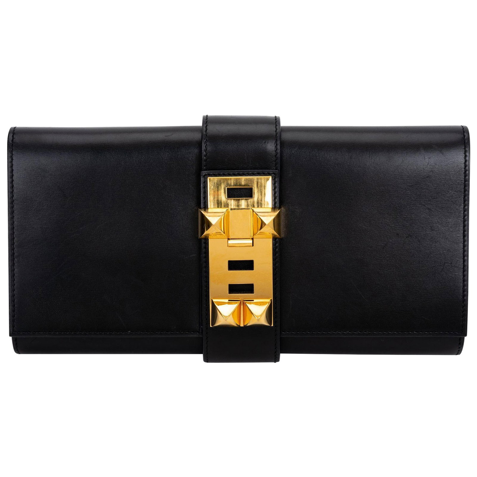 Hermes Black Box Calf Medor 23 Clutch 6 x 1.5 x 11.5 in Gold-Plated Hardware: Hermes Black Box Calf Medor 23 Clutch 6 x 1.5 x 11.5 in Gold-Plated Hardware Discover the elegance of the Hermes Black Box Calf Medor 23 Clutch, a stunning accessory that showcases exquisite craftsman
