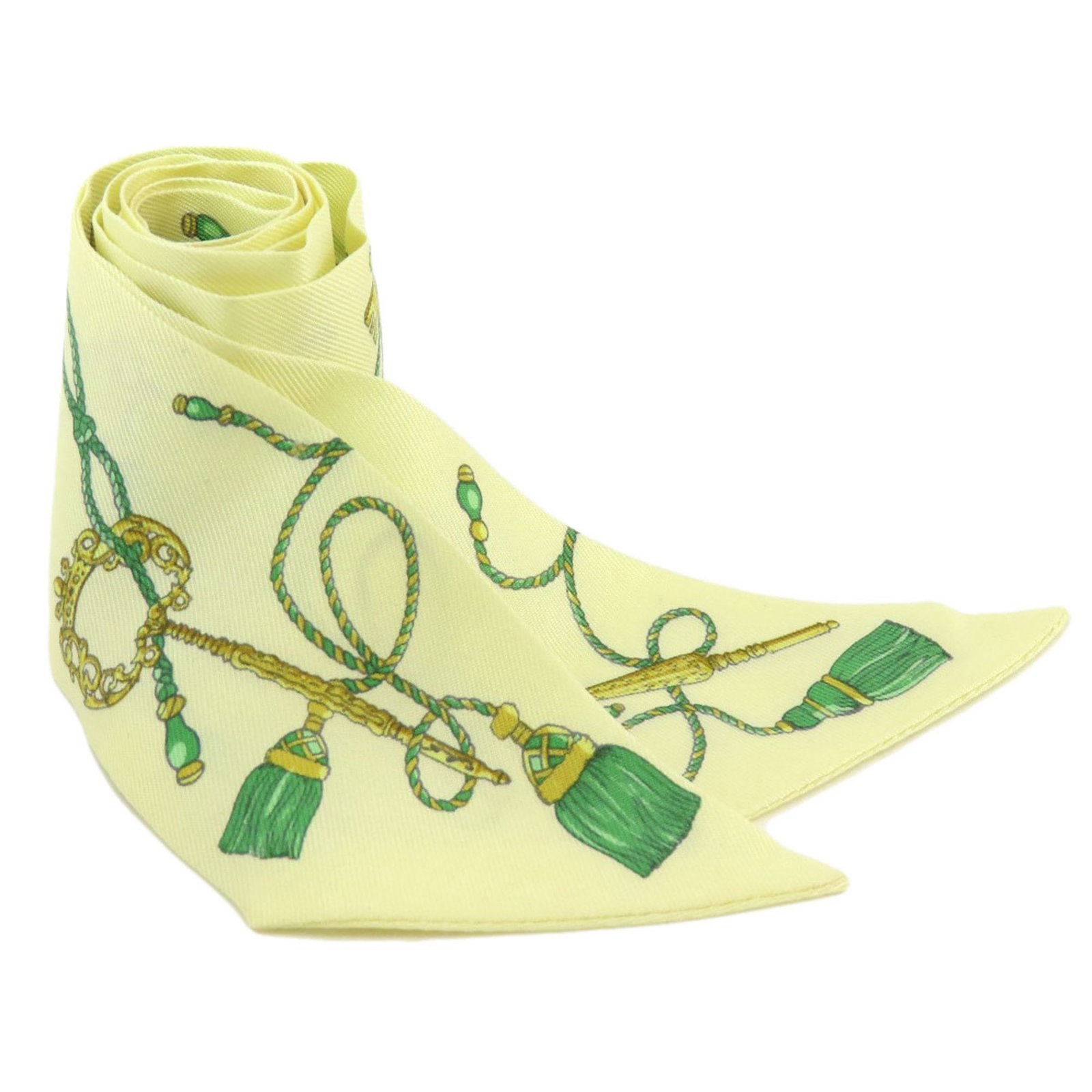 Hermes Twilly Silk Scarf Green Yellow 85.5cm x 5cm: Hermes Twilly Silk Scarf Green Yellow 85.5cm x 5cm This elegant Hermes Twilly Scarf is crafted from luxurious silk, blending a stunning mix of green and yellow hues. Designed specifically for women, i