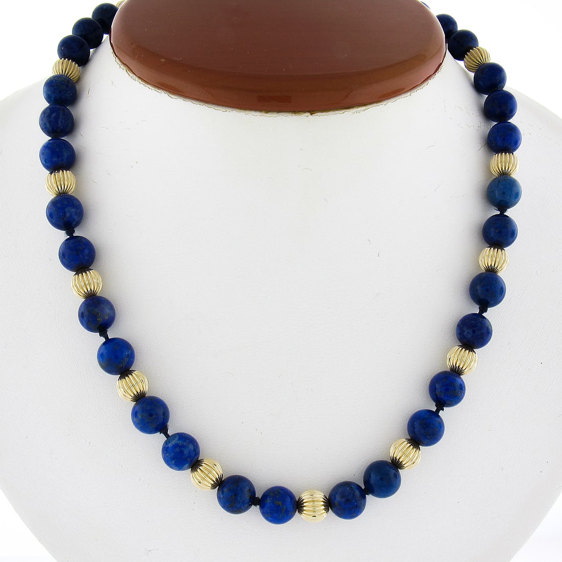 Vintage 14k Yellow Gold Lapis Lazuli Necklace 16" 8.4mm Beads: Vintage 14k Yellow Gold Lapis Lazuli Necklace 16" 8.4mm Beads This vintage necklace features a stunning combination of 34 natural genuine Lapis Lazuli beads, each approximately 8.4mm in size, beautifu