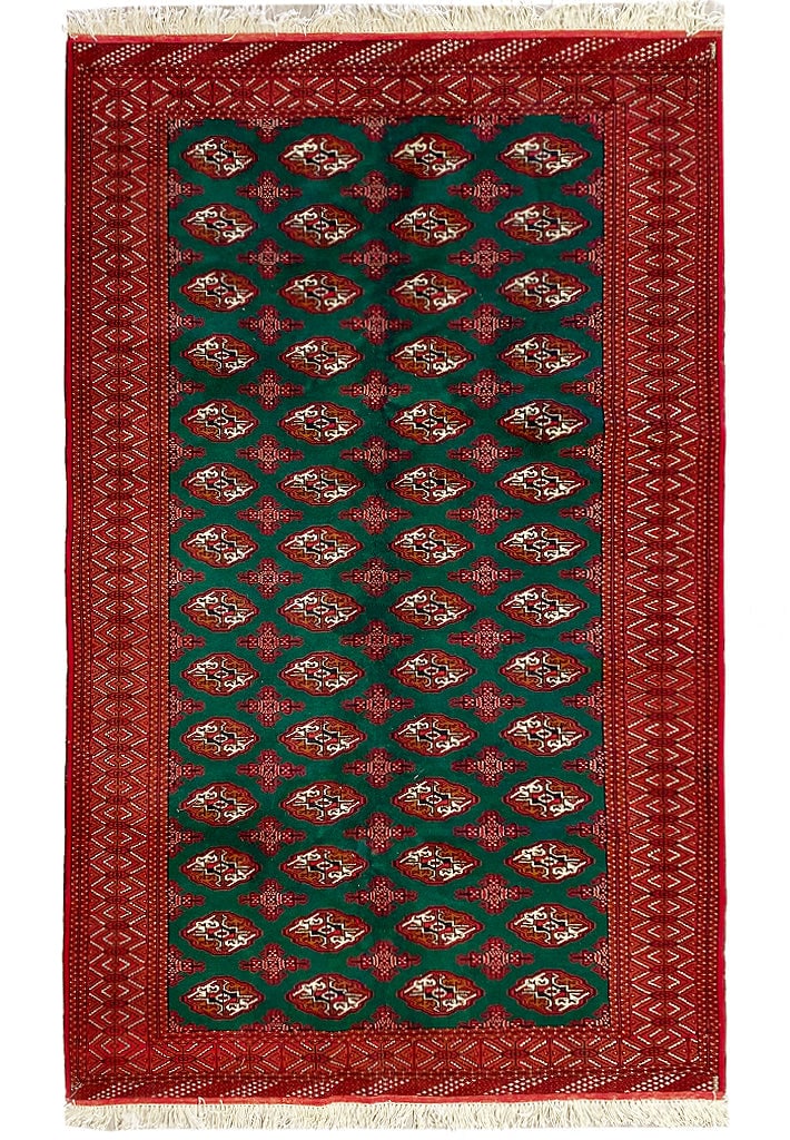 6' x 10' Handwoven Green Turkman Bokhara Persian Area Rug: 6' x 10' Handwoven Green Turkman Bokhara Persian Area Rug Introduce timeless elegance to your home with this stunning 6' x 10' Green Turkman Bokhara Persian Rug, a piece of handwoven artistry inspired