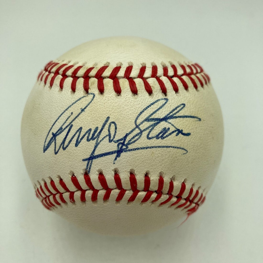 Ringo Starr Signed American League Baseball with Beckett COA: Ringo Starr Signed American League Baseball with Beckett COA Presented is an Official American League baseball signed by the former drummer of the Beatles, Ringo Starr. Ringo has penned his flowing si
