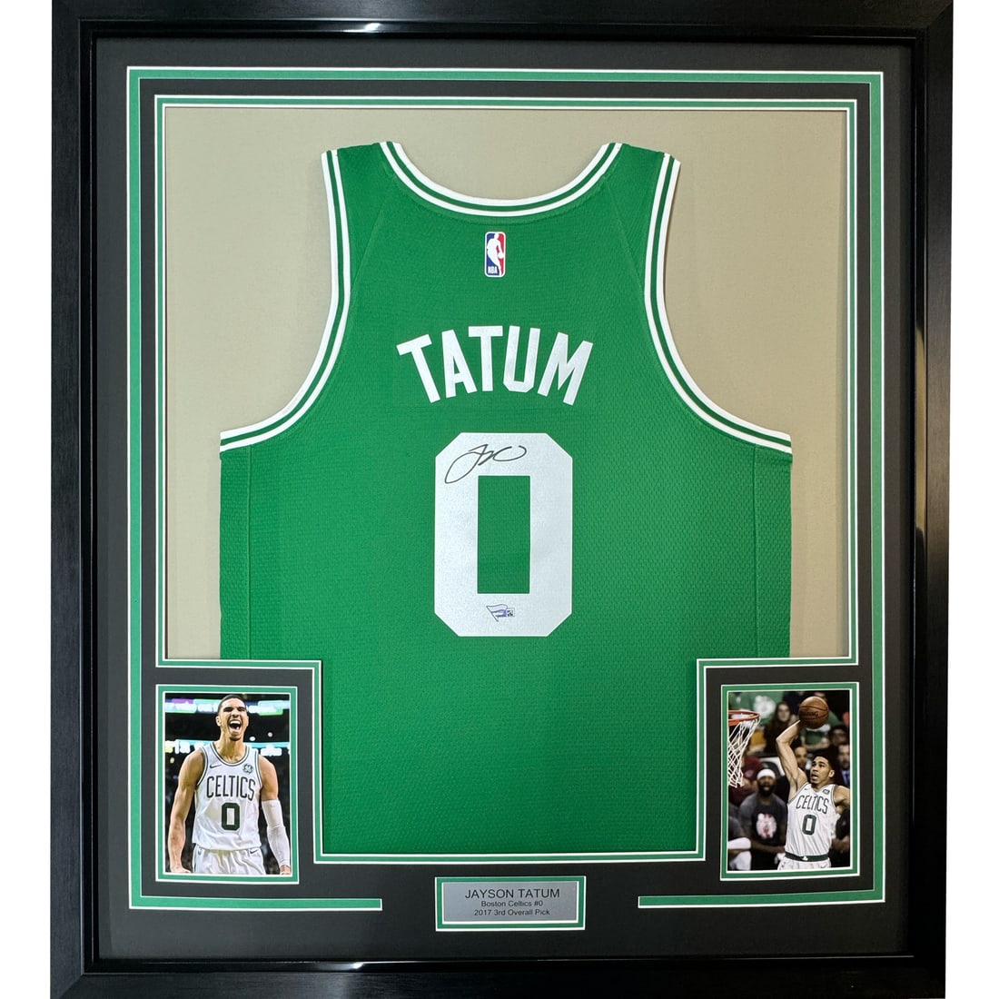 Framed Autographed Jayson Tatum 33x42 Celtics Jersey with Fanatics COA: Framed Autographed Jayson Tatum 33x42 Celtics Jersey with Fanatics COA This is a framed autographed jersey of Jayson Tatum, a prominent player for the Boston Celtics. The jersey measures 33x42 inches 