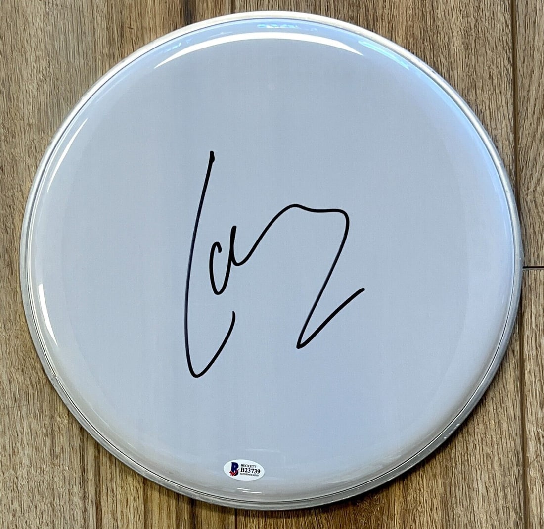 Lars Ulrich Signed 12 Inch Drum Head Beckett Authenticated: Lars Ulrich Signed 12 Inch Drum Head Beckett Authenticated Lars Ulrich Signed 12 inch drum head 12 inch white drum head signed perfectly by legendary drummer for the mega band Metallica, LARS ULRICH.