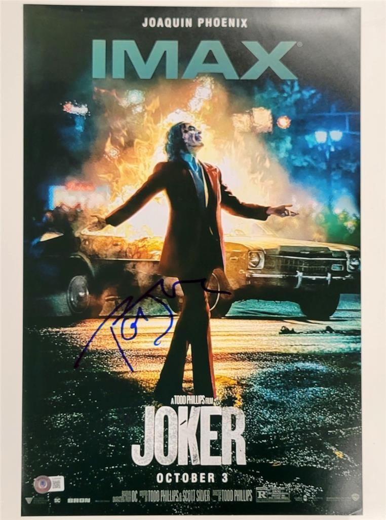 Todd Phillips Signed 12x18 Joker Photo Poster Beckett Authenticated: Todd Phillips Signed 12x18 Joker Photo Poster Beckett Authenticated This is an original 12x18 photograph poster of the movie 'Joker,' signed by director Todd Phillips. The autograph has been authentic