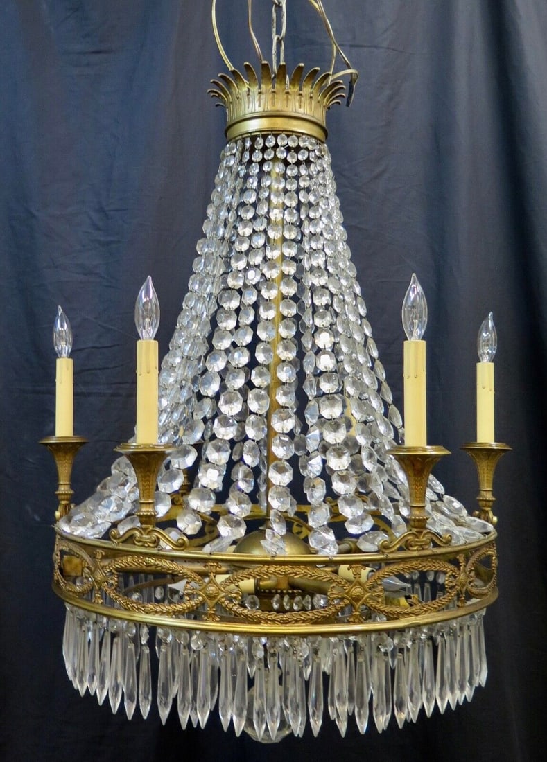 Antique 1890s French Gilt Bronze Crystal Chandelier 33" Long 24" Diameter: Antique 1890s French Gilt Bronze Crystal Chandelier 33" Long 24" Diameter This stunning vintage French chandelier from the 1890s showcases a magnificent design combining gilt bronze and crystal elemen