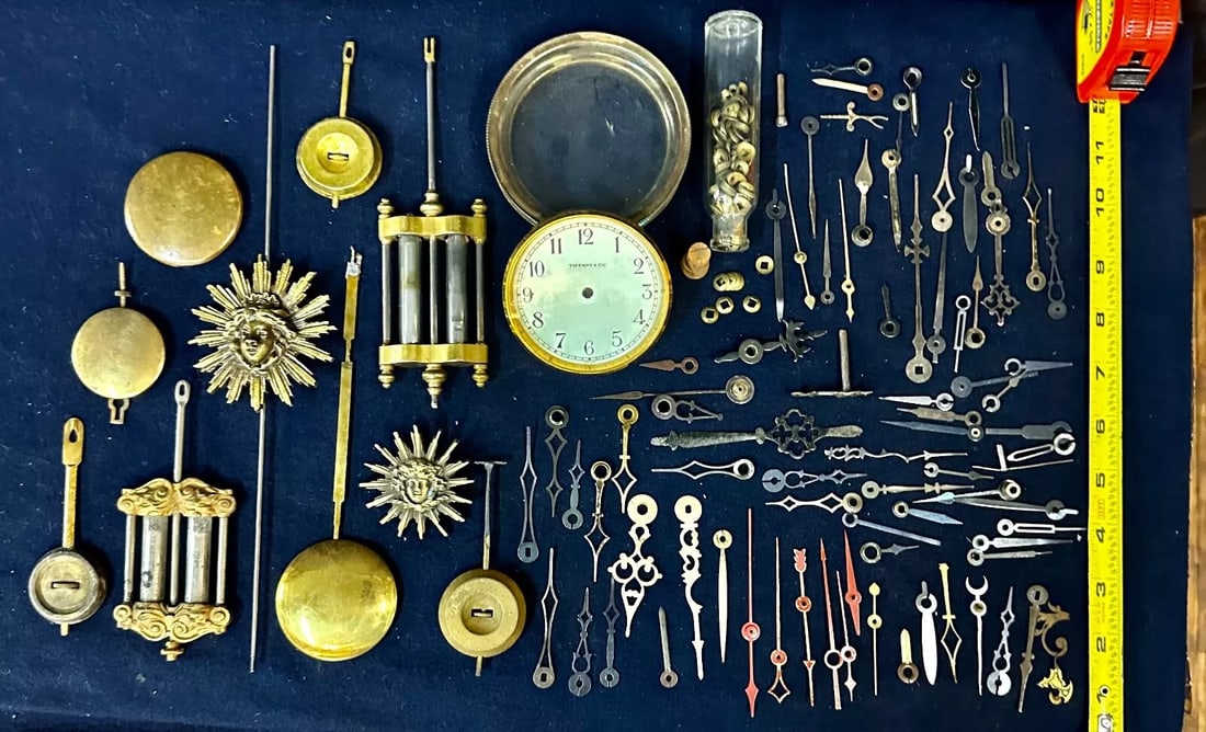 Vintage Antique Clock Parts Collection with Tiffany Clock Face: Vintage Antique Clock Parts Collection with Tiffany Clock Face This unique collection of antique clock parts, dating back to the early 20th century, includes a variety of components perfect for restor