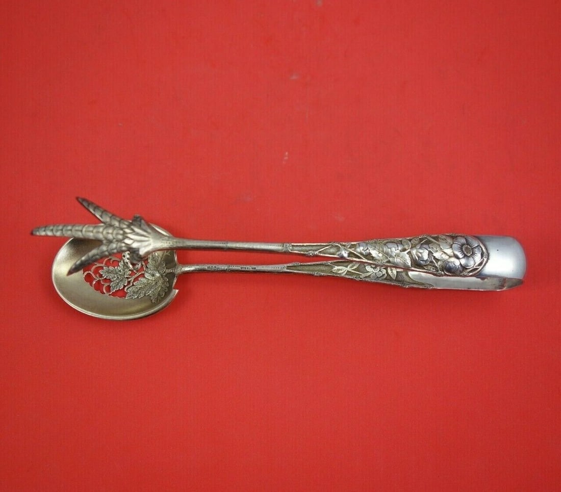 Gorham Eglantine Sterling Silver Ice Tongs 8 3/8 Strawberry Claw Spoon: Gorham Eglantine Sterling Silver Ice Tongs 8 3/8 Strawberry Claw Spoon Enhance your serving experience with the Eglantine ice tongs from Gorham, expertly crafted from sterling silver. This exquisite p
