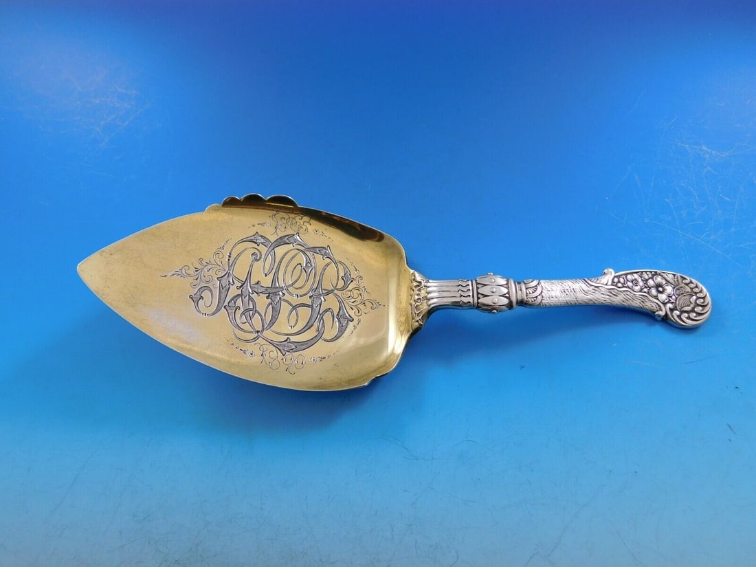 Frank Smith 8 Inch Sterling Silver Gold-Washed Pie Server 1865-1890: Frank Smith 8 Inch Sterling Silver Gold-Washed Pie Server 1865-1890 This exquisite pie server from Frank Smith is crafted from sterling silver, featuring a flat handle and a gold-washed, brite-cut bla