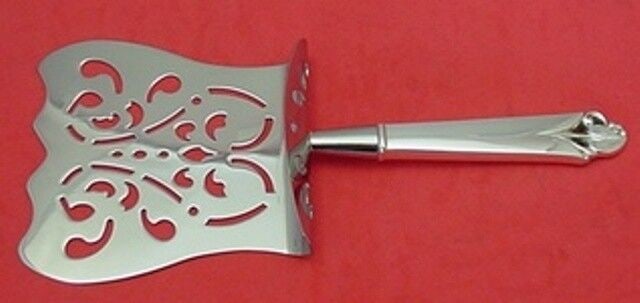 Frank Smith Woodlily Sterling Silver Asparagus Server 9 1/8 Custom: Frank Smith Woodlily Sterling Silver Asparagus Server 9 1/8 Custom This exquisite Woodlily asparagus server by Frank Smith features a hollow handle crafted from sterling silver, complemented by a stai