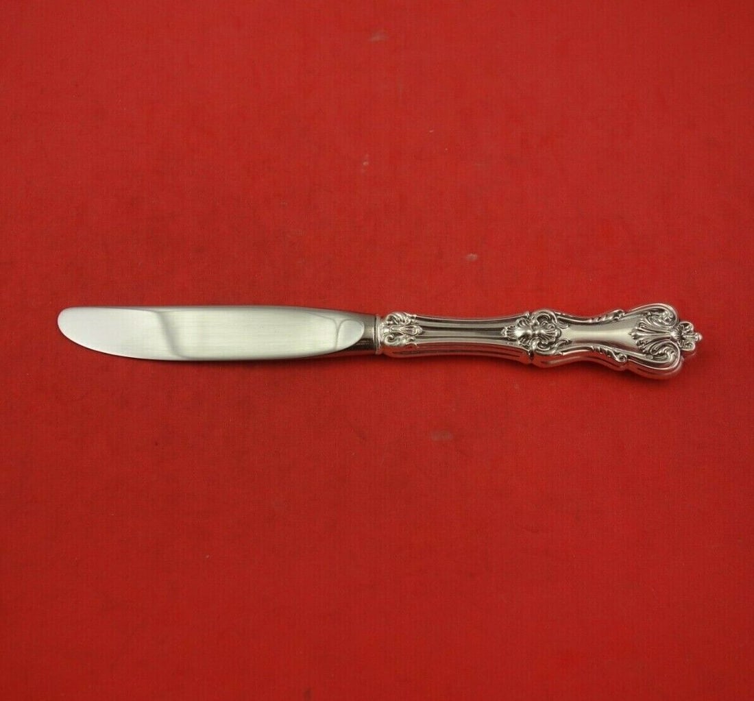 Frank Smith Federal Cotillion Sterling Silver Butter Spreader 6 1/2": Frank Smith Federal Cotillion Sterling Silver Butter Spreader 6 1/2" This elegant butter spreader features the Federal Cotillion pattern by Frank Smith, crafted from high-quality sterling silver. The