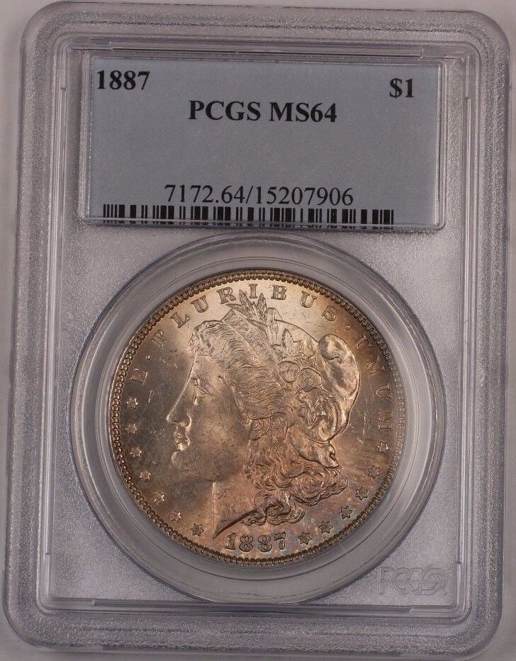 1887 US Morgan Silver Dollar Coin PCGS MS64 Uncirculated Silver: 1887 US Morgan Silver Dollar Coin PCGS MS64 Uncirculated Silver This 1887 US Morgan Silver Dollar Coin is a remarkable collectible piece, certified by PCGS with a grade of MS 64. Minted in Philadelphi