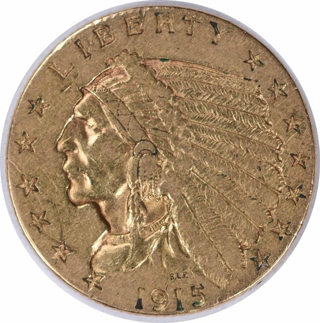 1915 Gold Indian $2.50 Coin Bela Lyon Pratt XF Uncertified: 1915 Gold Indian $2.50 Coin Bela Lyon Pratt XF Uncertified This 1915 $2.50 Gold Indian coin features an elegant design by Bela Lyon Pratt. The coin, minted in Philadelphia, is composed of 90% gold and