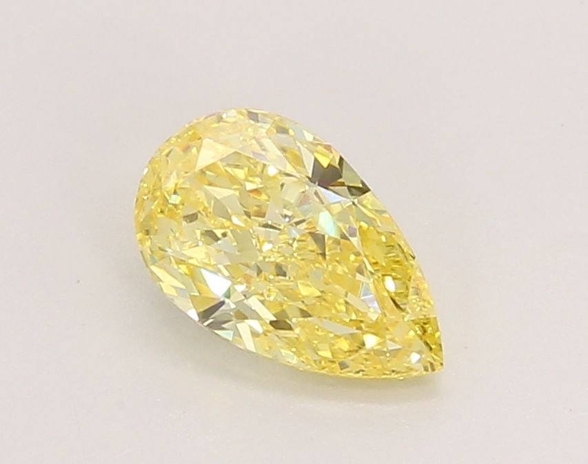 Loose Diamond - PEAR 0.92ct Fancy Vivid Yellow VVS2: Loose Diamond - PEAR 0.92ct Fancy Vivid Yellow VVS2 Source: This is a real non-mined Diamond that has been grown in a lab Shape: PEAR Carats: 0.92 Color: Fancy Vivid Yellow Certification: IGI Video: