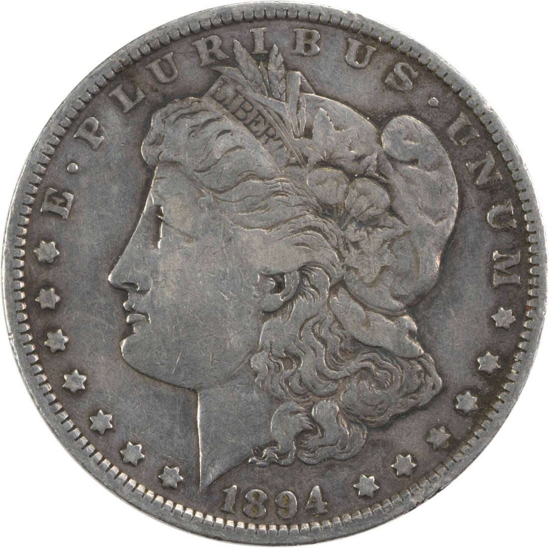 1894 Morgan Silver Dollar VF Uncertified 90% Silver Coin: 1894 Morgan Silver Dollar VF Uncertified 90% Silver Coin This 1894 Morgan Silver Dollar is a remarkable piece of numismatic history. It features a grade of VF (Very Fine) and is composed of 90% silver