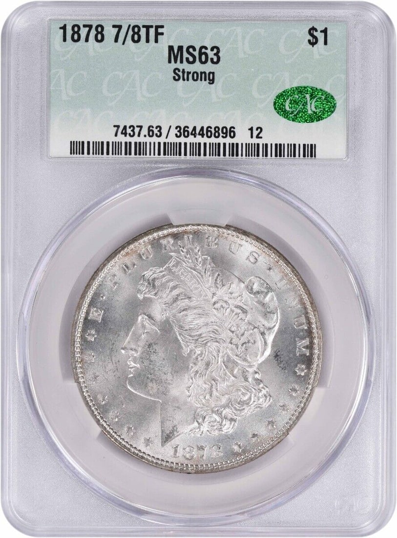 1878 Morgan Silver Dollar MS63 CACG Uncirculated 90% Silver: 1878 Morgan Silver Dollar MS63 CACG Uncirculated 90% Silver This 1878 Morgan Silver Dollar is a stunning example of numismatic artistry, featuring a grade of MS63 as certified by CACG. Struck in Phila