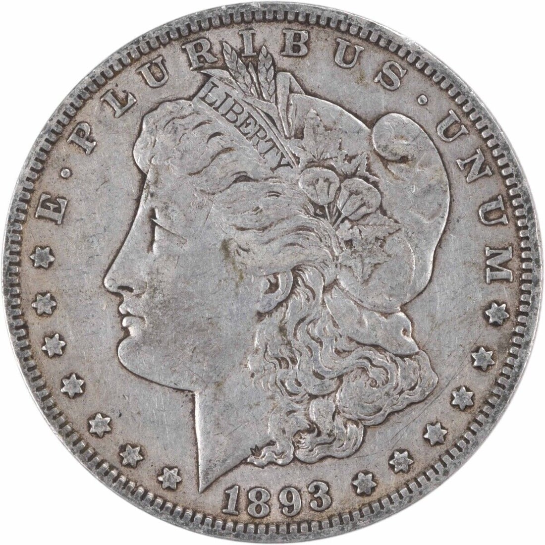 1893-O Morgan Dollar XF Uncertified Silver Coin by George T. Morgan: 1893-O Morgan Dollar XF Uncertified Silver Coin by George T. Morgan This 1893-O Morgan Dollar showcases the craftsmanship of designer George T. Morgan. It features a reeded edge and has a denomination