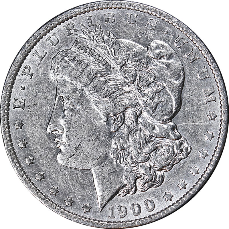 1900-O/CC Morgan Silver Dollar Nice AU Key Date Silver Coin: 1900-O/CC Morgan Silver Dollar Nice AU Key Date Silver Coin This 1900-O/CC Morgan Silver Dollar is a key date coin that exhibits nice eye appeal and a strong strike. It is graded as Nice AU, indicatin