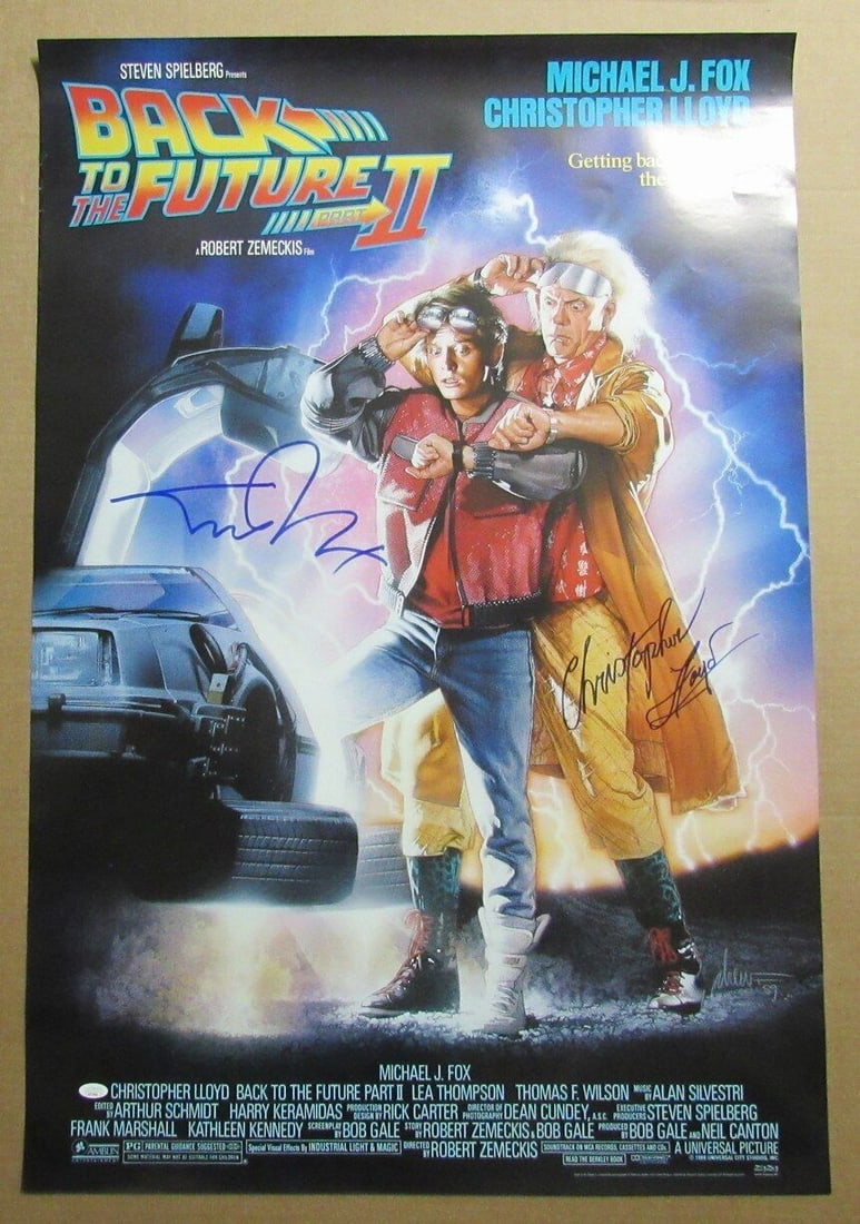 Michael J Fox Christopher Lloyd Signed 27x40 Back to the Future II Poster JSA Authenticated: Michael J Fox Christopher Lloyd Signed 27x40 Back to the Future II Poster JSA Authenticated This autographed 27x40 poster features Michael J. Fox and Christopher Lloyd from the iconic movie "Back to t