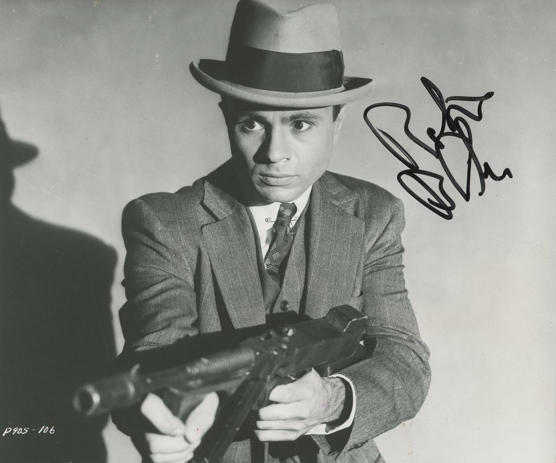 Robert Blake Signed 7x8.5 Photo The Purple Gang Beckett Authenticated: Robert Blake Signed 7x8.5 Photo The Purple Gang Beckett Authenticated This authentic 7x8.5 photograph features the signature of Robert Blake, a notable figure from The Purple Gang. The item is an orig