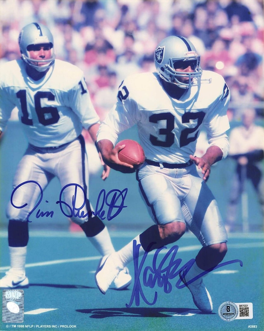 MARCUS ALLEN JIM PLUNKETT Signed 8x10 Photo Oakland Raiders BAS Authenticated: MARCUS ALLEN JIM PLUNKETT Signed 8x10 Photo Oakland Raiders BAS Authenticated This is a signed color 8x10 photo featuring football legends Marcus Allen and Jim Plunkett, both of whom are notable playe