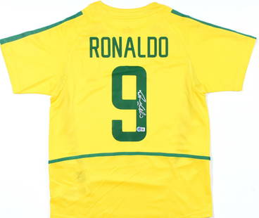 Ronaldo Nazario Signed Brazil FC Home Jersey #9 with Beckett Hologram: Ronaldo Nazario Signed Brazil FC Home Jersey #9 with Beckett Hologram This is an original Brazil FC home yellow soccer jersey, featuring the iconic #9 worn by legendary player Ronaldo Nazario. The jer