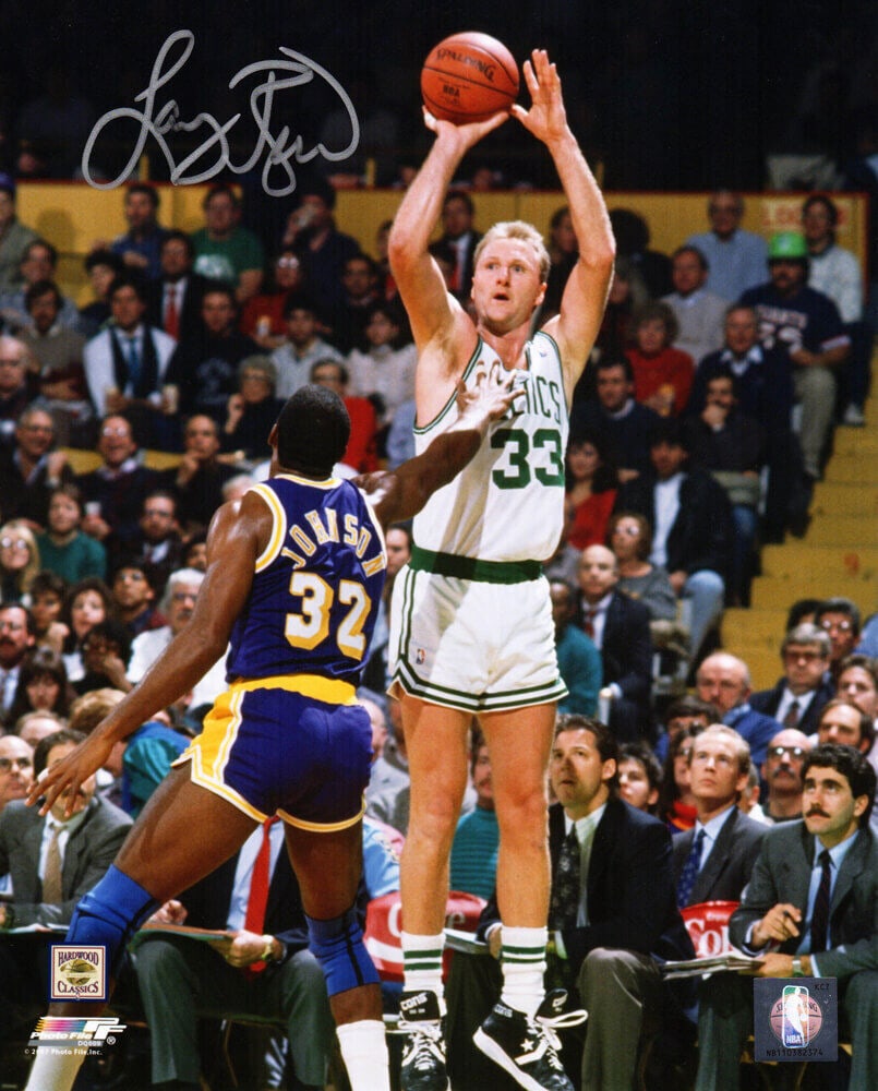 Larry Bird Signed 8x10 Celtics Photo Shooting Over Magic Johnson: Larry Bird Signed 8x10 Celtics Photo Shooting Over Magic Johnson Celebrate basketball history with this iconic 8x10 photo featuring Larry Bird shooting over Magic Johnson. This original signed piece i